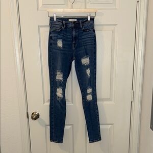dark wash distressed high rise jegging